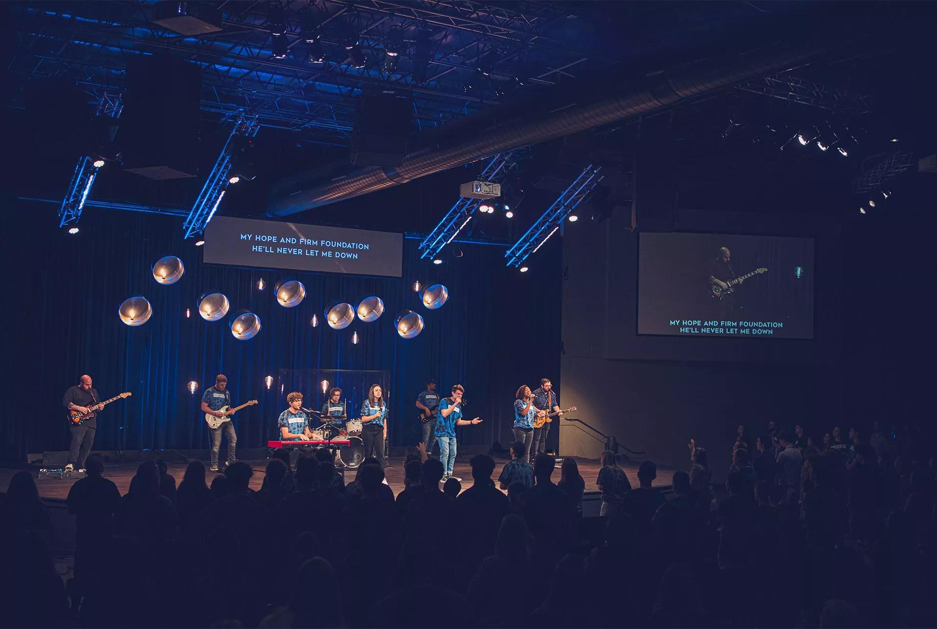 Band playing on stage, front view