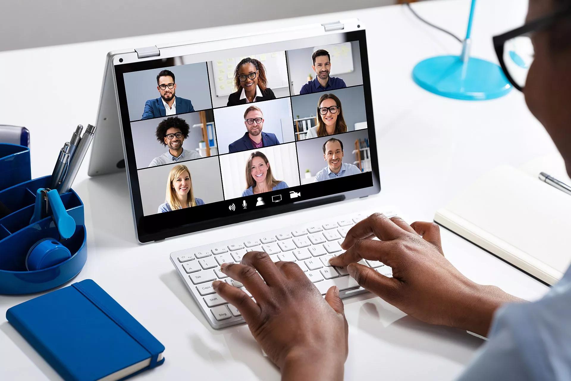 A person attending a videoconferencing meeting on a tablet.